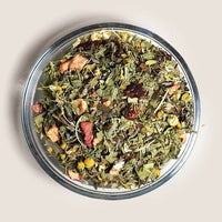 Herbal tea in a glass dish