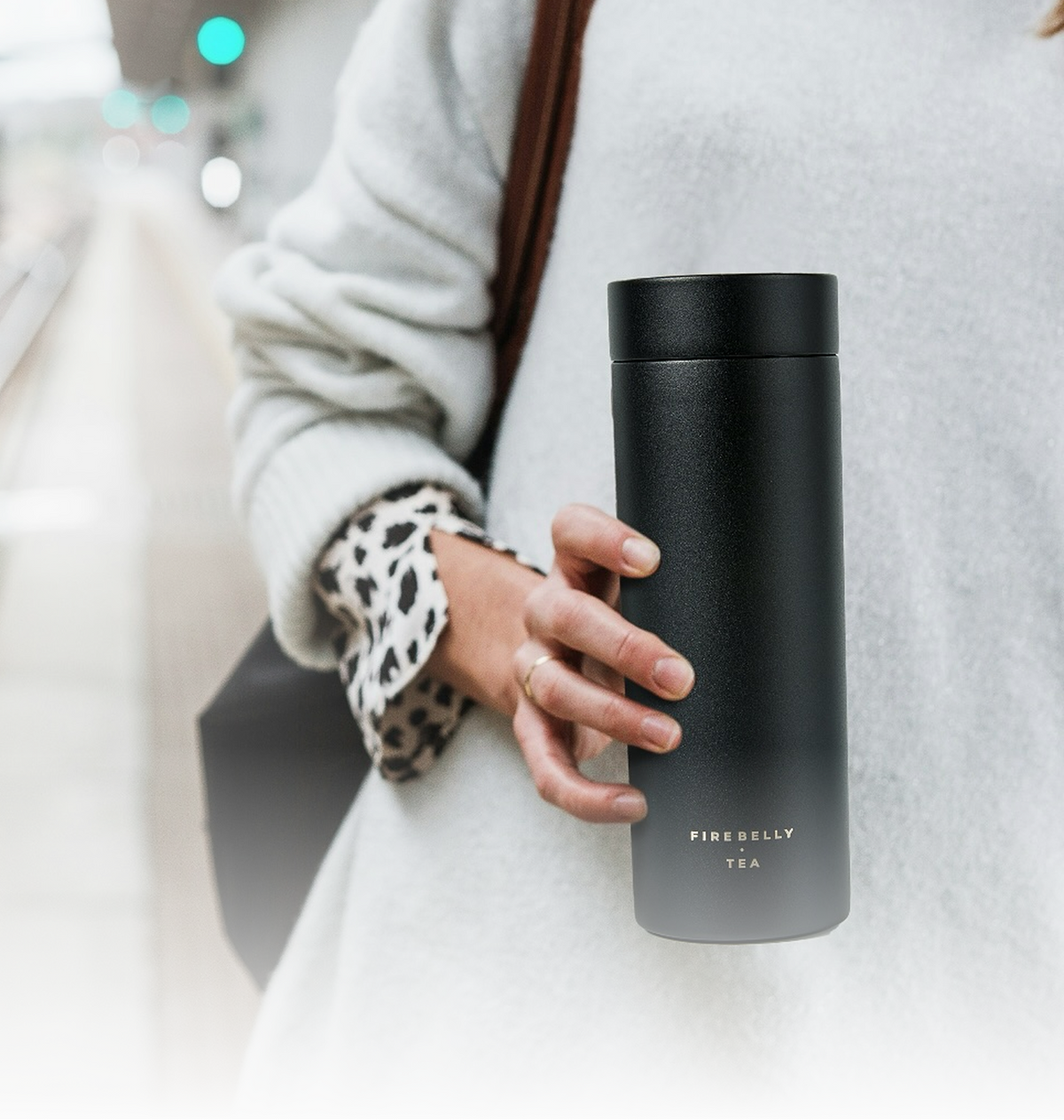 Holding the Travel Mug